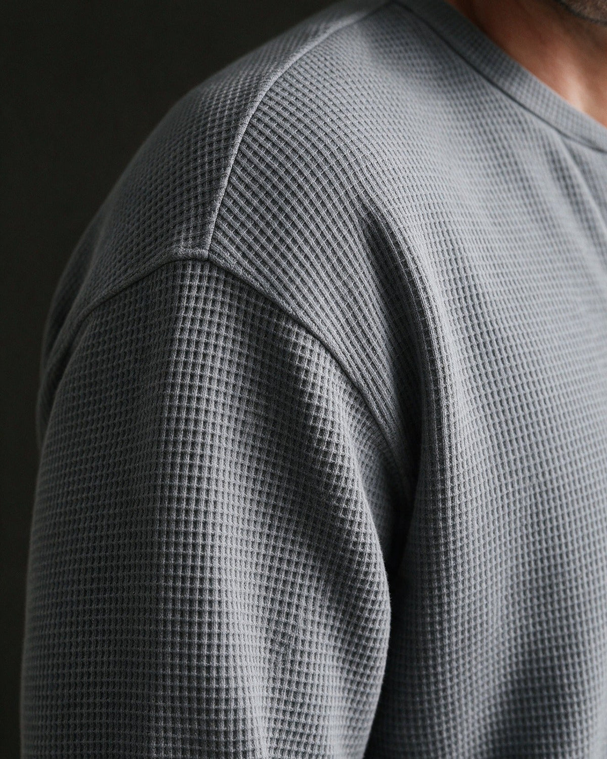 Denholm waffle knit at the dropped shoulder, close-up