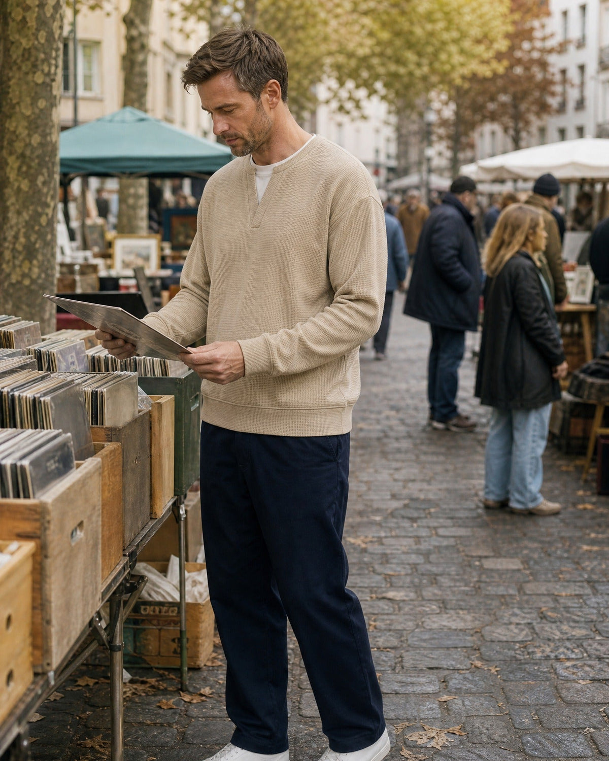 Denholm waffle-knit top in Beige, browsing records at a flea market